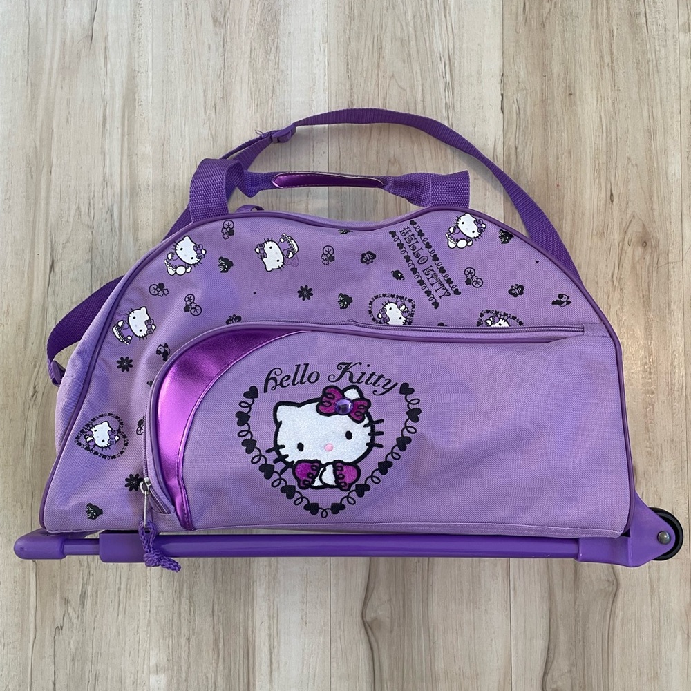 Hello Kitty Purple kid travel duffle tote roller bag extendable handle